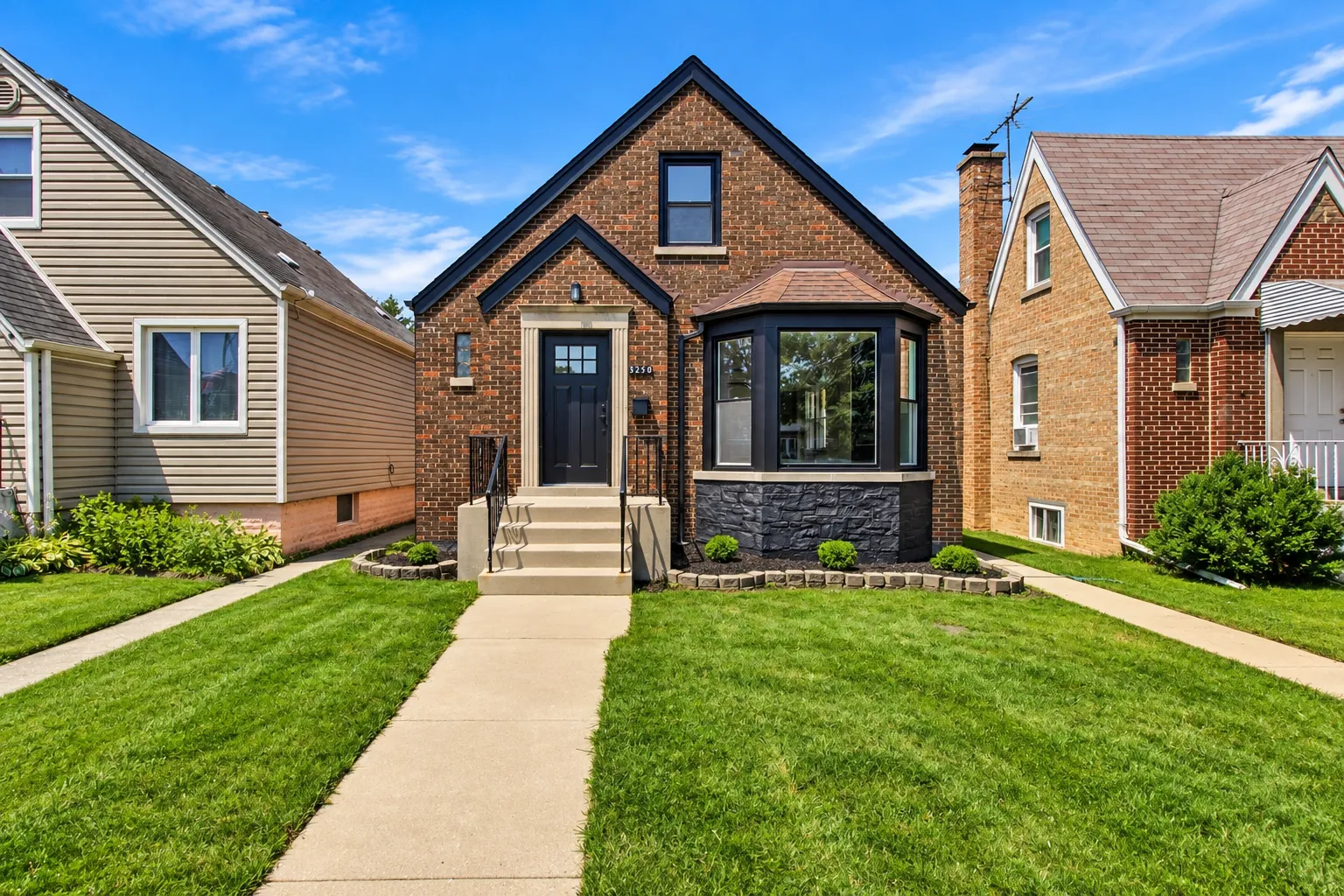 Brick bungalow on a tree-lined suburban street